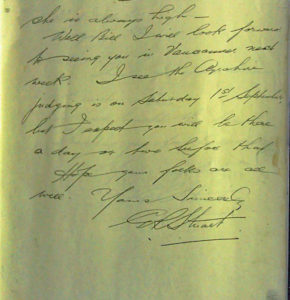 Sepia photo of a page with cursive writing